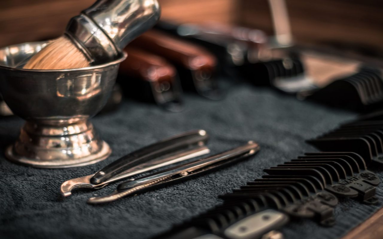 Combs and razors laid out in a barber shop