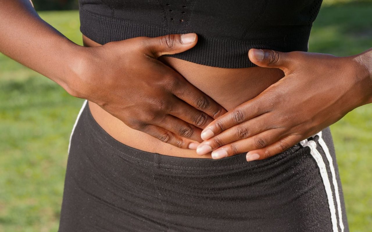 A person holding their stomach